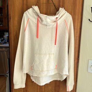 We The Free knit hoodie with neon pink trim and kangaroo pocket